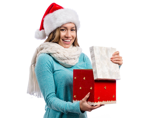 Woman opening Christmas present - Φωτογραφία, εικόνα