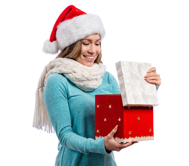 Woman opening Christmas present - Foto, Bild