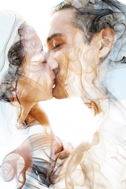 Kissing couple combined with smoke - Zdjęcie, obraz
