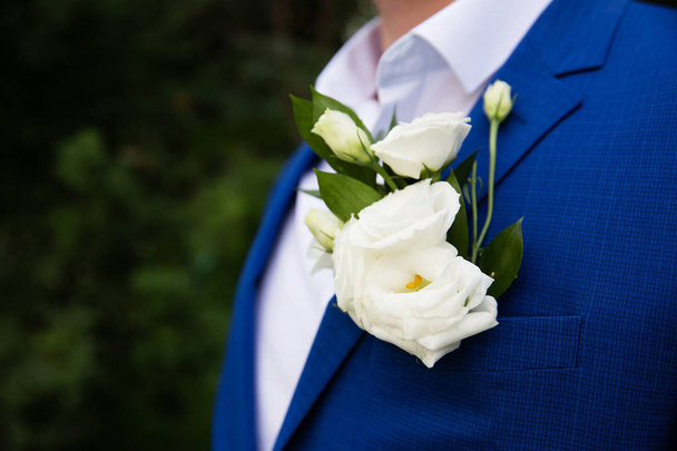 Wedding boutonniere on suit of groom - Photo, Image