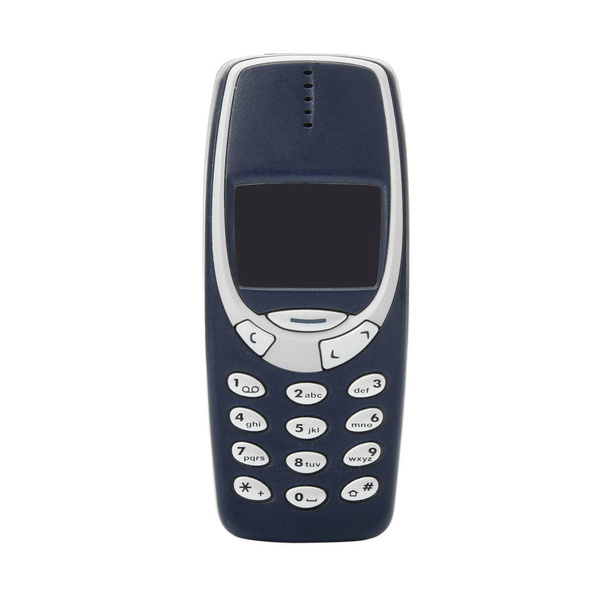 teléfono celular obsoleto sobre fondo blanco
 - Foto, Imagen