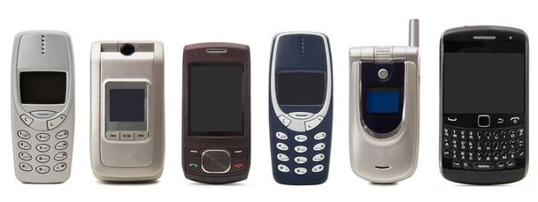 teléfono celular obsoleto sobre fondo blanco
 - Foto, Imagen