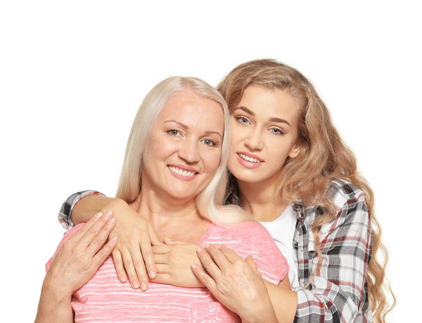Young woman with her mother, isolated on white - Photo, Image