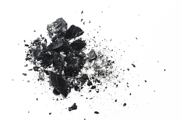 Pile of black coal bars isolated on white background - Foto, imagen