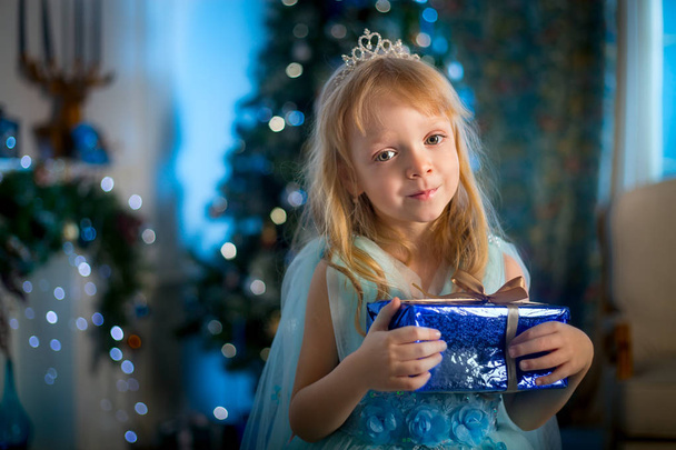Little girl  at Christmas Eve - Foto, Imagen