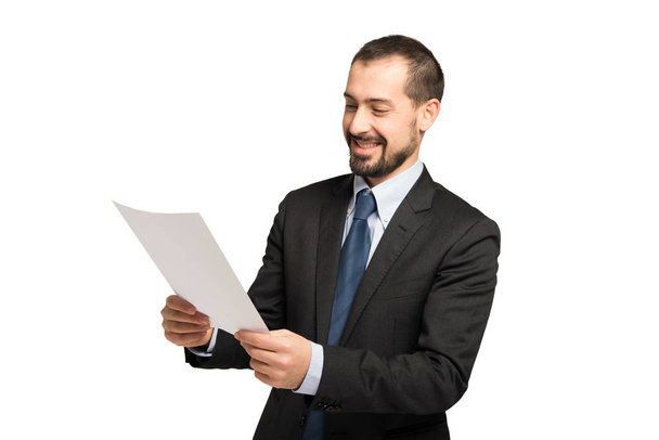 man reading document - Foto, afbeelding
