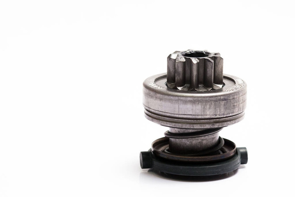 Spare part of the car. Bendix starter on a white background. - Photo, Image