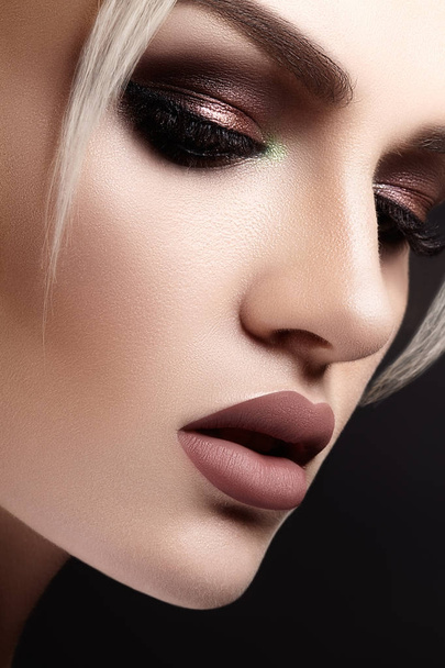 Closeup with of beautiful blond woman. Fashion makeup, clean shiny skin. Makeup and cosmetic. Beauty style on model face - Photo, Image