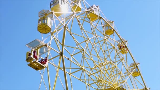 Shot of ferris wheel turning in the amusement park. - Footage, Video