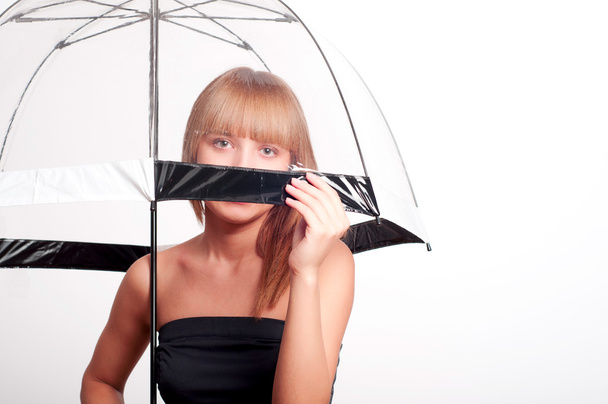 Woman holding umbrella - Fotografie, Obrázek
