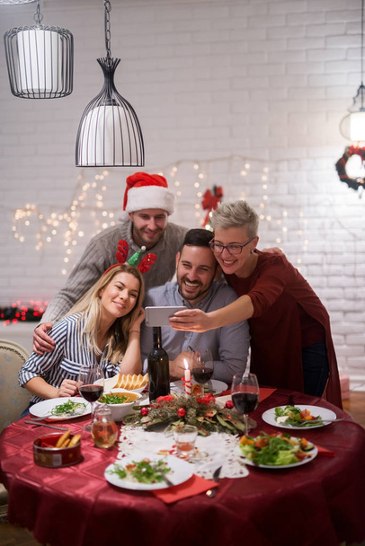 happy friends celebrating Christmas  - Valokuva, kuva