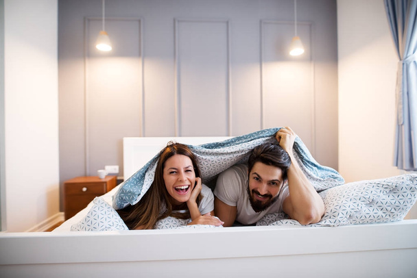 couple in pajamas bedroom - Photo, Image