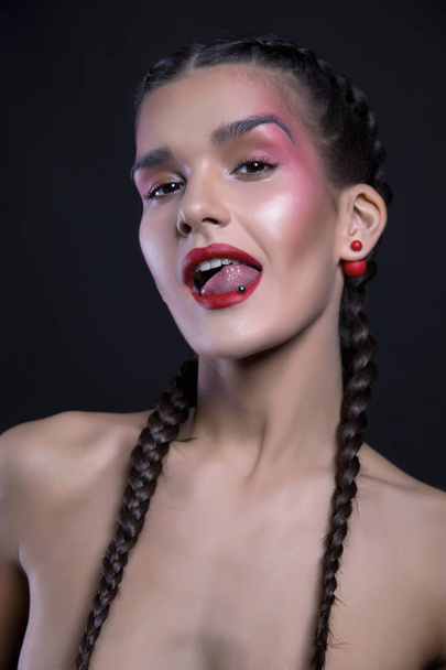 young woman with Piercing in tongue and Braids - Fotoğraf, Görsel