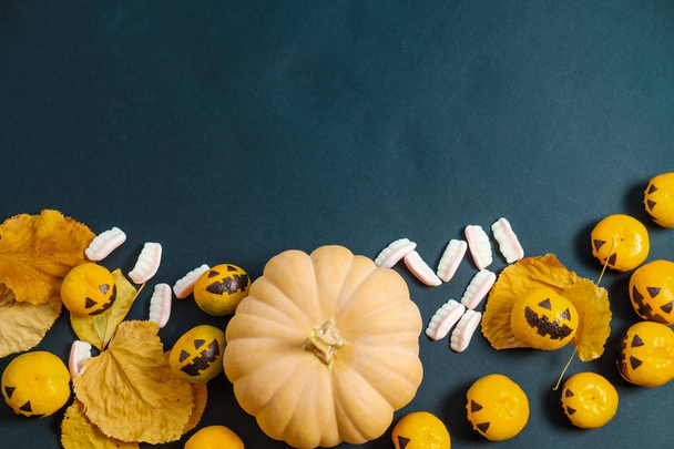 Top View Halloween with fake pumpkins and tangerines with painte - 写真・画像