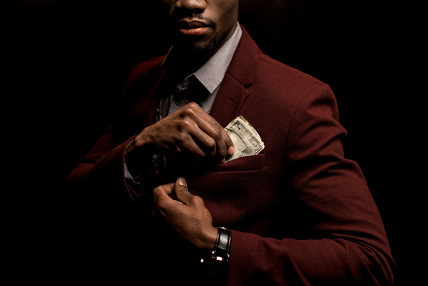 άνθρωπος με χαρτονομίσματα του δολαρίου  - Φωτογραφία, εικόνα
