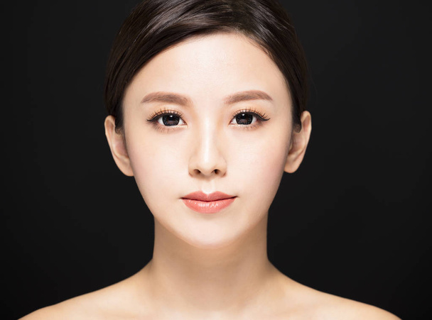 closeup Beauty woman face isolated on black background - Photo, Image