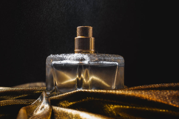 bottle of wet perfume  - 写真・画像