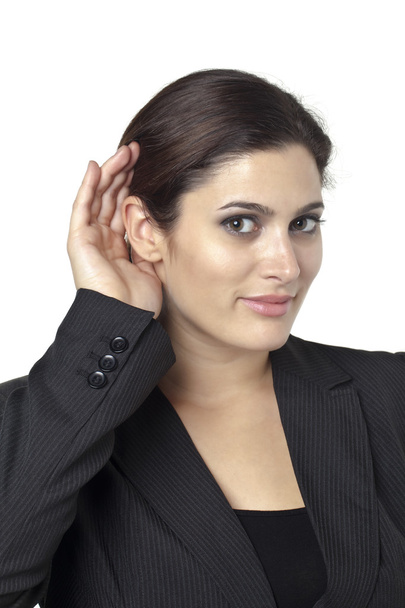 beautiful businesswoman listening gossip - Foto, Imagen