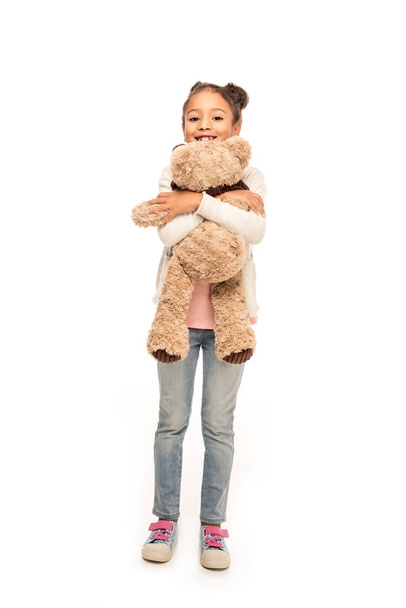 african american child with teddy bear - Фото, изображение