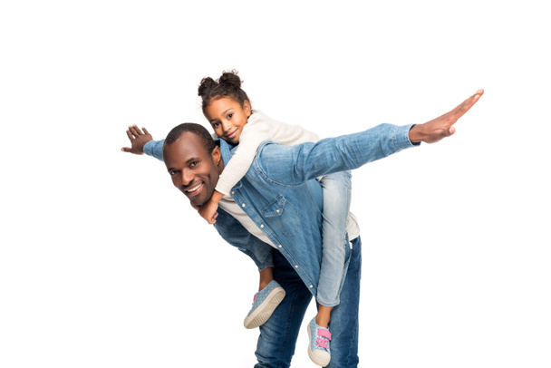 Padre piggybacking figlia
 - Foto, immagini