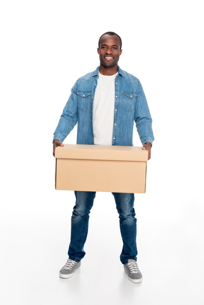 man holding cardboard box  - Zdjęcie, obraz
