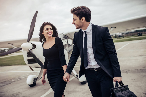 Couple near plane - Photo, image