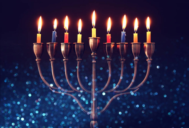 jewish holiday Hanukkah background with menorah (traditional candelabra) and burning candles - Valokuva, kuva