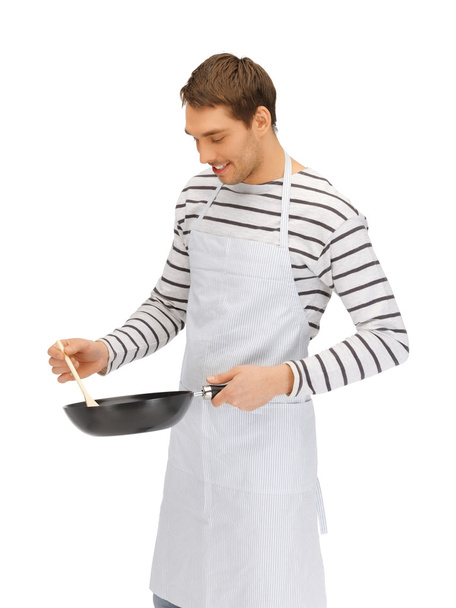 Handsome man with pan and spoon - Fotó, kép