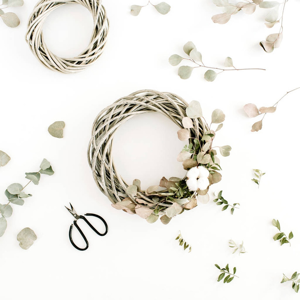 Wreath frame with cotton balls and eucalyptus branches - Photo, Image