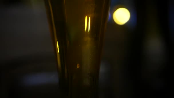 A glass of frothy beer in a bar misted by the cold. slowmotion, HD, 1920x1080 - Felvétel, videó
