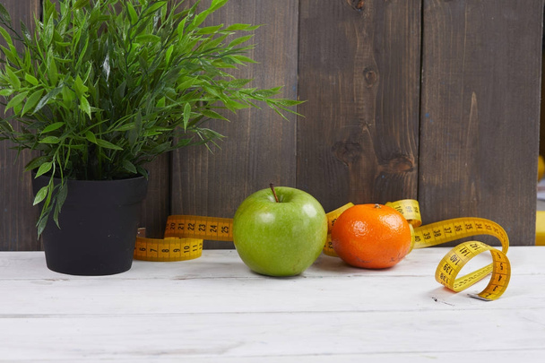 fruits with measuring tape, healthy concept  - Zdjęcie, obraz