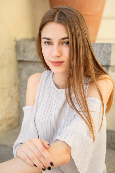 Beautiful brunette young woman wearing fashionable clothes - Fotografie, Obrázek
