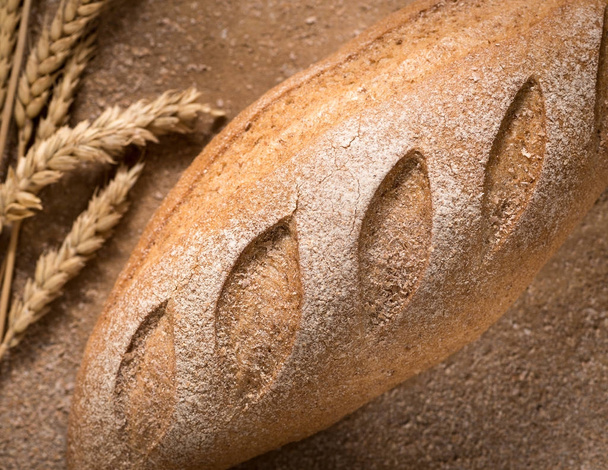loaf of bread top view - Фото, изображение