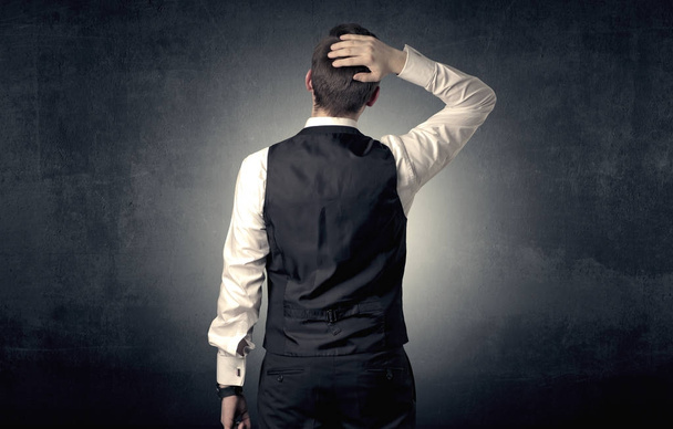 Businessman standing and thinking - Foto, Imagen