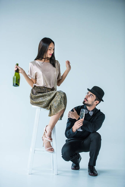 multiethnic couple with champagne - Φωτογραφία, εικόνα