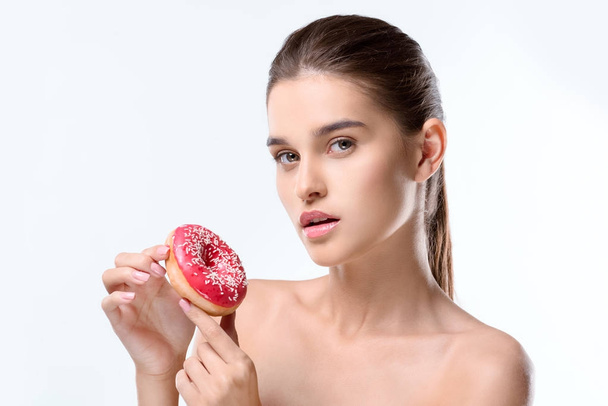 woman holding donut - Foto, Imagen