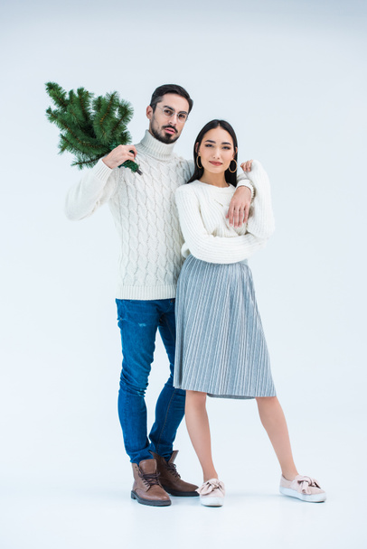 multicultural couple with christmas tree - Foto, Bild