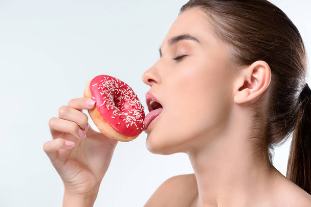 woman holding donut - Photo, Image