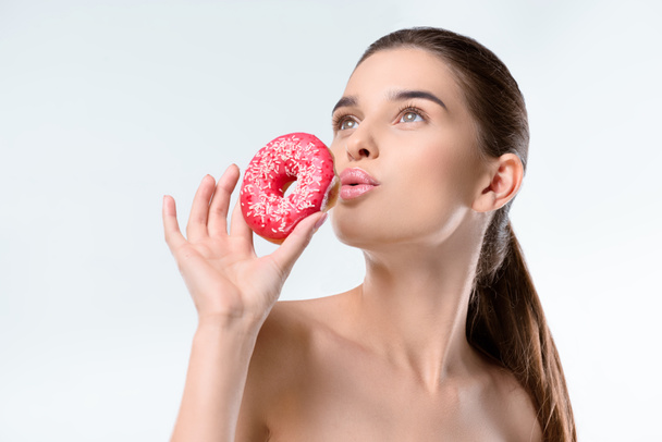 mulher segurando donut
 - Foto, Imagem