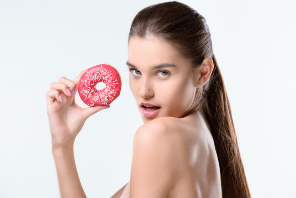 woman holding donut - Фото, изображение