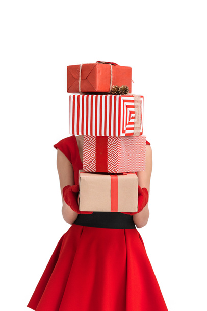 mujer sosteniendo regalos de Navidad
 - Foto, imagen