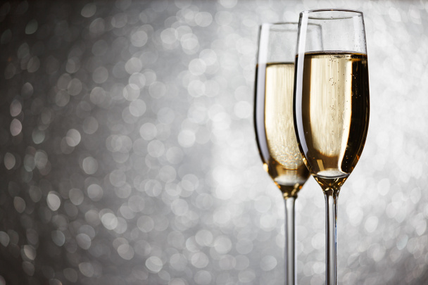 Festive picture of two wine glasses with sparkling champagne - Photo, Image