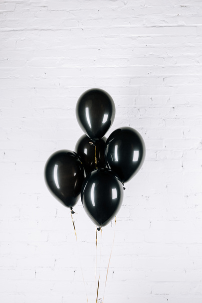 black shiny balloons - Фото, изображение