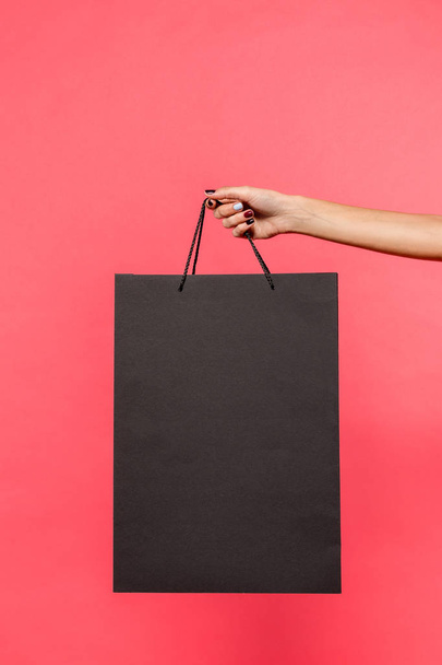 person holding shopping bag - Photo, Image