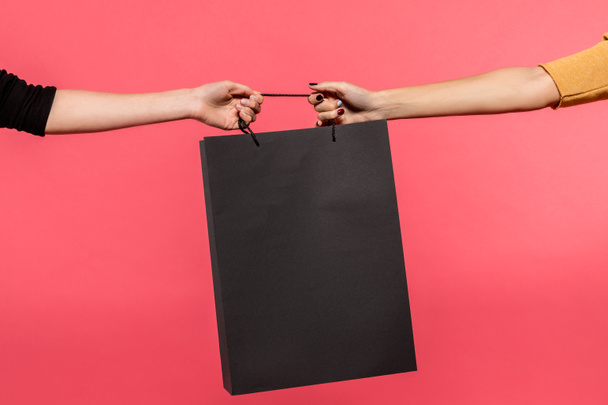 women pulling shopping bag - Photo, Image