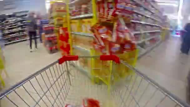 4K trolley in a supermarket timelapse. UHD stock video - Záběry, video