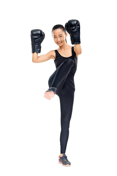 woman wearing boxing gloves - Foto, Bild