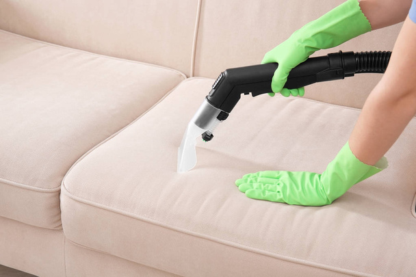 Woman cleaning couch  - Zdjęcie, obraz