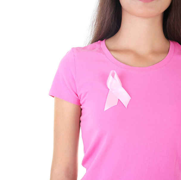 Woman wearing t-shirt with pink ribbon - Foto, afbeelding