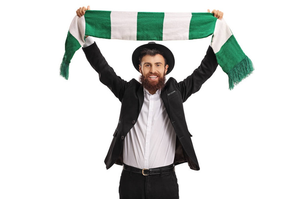 Religious man cheering with a scarf - Foto, Bild